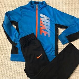 Nike boys warm up suit blue and black from Macy’s
Size 5S